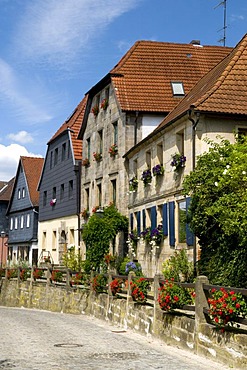 Slate-tiled sandstone buildings along the Oberen Markt in Thurnau, Franconian Switzerland, Franconia, Bavaria, Germany, Europe