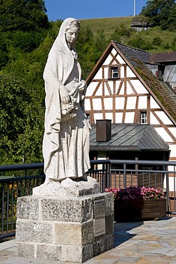 The statue of St. Elizabeth in Pottenstein, Naturpark Fraenkische Schweiz nature preserve, Little Switzerland region, Franconia, Bavaria, Germany, Europe