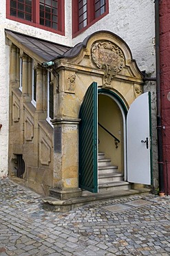 Entrance to the Evangelische Schlosskirche Protestant castle church in the castle courtyard, Schloss Iburg castle, Bad Iburg, Osnabruecker Land region, Lower Saxony, Germany, Europe