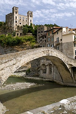 Arch bridge and Castello Doria, mountain village Dolceacqua in the Nervia Valley, Riviera, Liguria, Italy, Europe