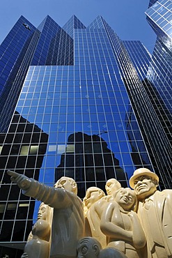 Illuminated Crowd sculpture by Raymond Masson in front of a skyscraper, downtown Montreal, Quebec, Canada, North America