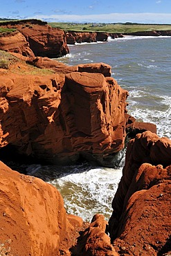 Red cliffs at Cap du Phare, Ile du Cap aux Meules, Iles de la Madeleine, Magdalen Islands, Quebec Maritime, Canada, North America