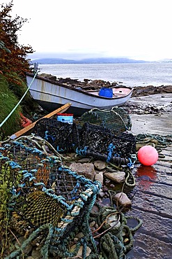 Dinghy and lobster pots on boat ramp, Ring of Kerry, County Kerry, Ireland, Europe