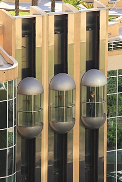 Three glass elevators on the facade of the Hotel Le Meridien Beach Plaza, Le Larvotto, Monaco, Cote d'Azur, Europe