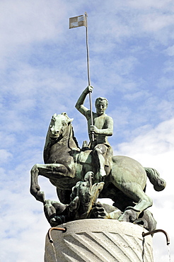 St. George Fountain, equestrian sculpture, horse and rider with a lance, War Memorial, Town Hall Square, Ahaus, Muensterland, North Rhine-Westphalia, Germany, Europe