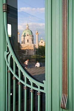 Art Nouveau city railway station Karlsplatz, 1899, by Otto Wagner, reflection of the Karlskirche church, Vienna, Austria, Europe