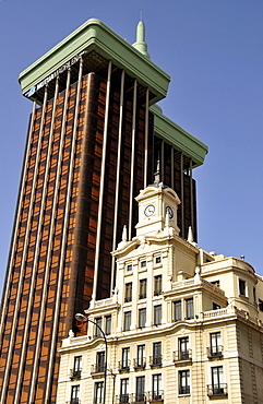 Old clock tower in front of the Torres de Colon building on the Plaza de Colon, Madrid, Spain, Iberian Peninsula, Europe