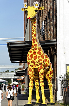 Giant giraffe made of Lego bricks, eye-catcher in front of the Legoland Discovery Center, inner harbor, Duisburg, Ruhrgebiet area, North Rhine-Westphalia, Germany, Europe