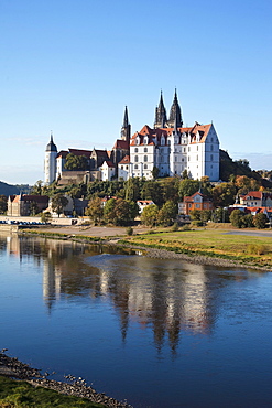 Albrechtsburg castle seen from the opposite side of the Elbe river, the Elbe at very low water, in Meissen, Saxony, Germany, Europe