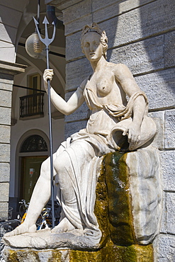 Statue of Dora Baltea on the portico of Hotel de Ville, town hall, Piazza Emile Chanoux, Aosta, Aosta Valley, Valle d'Aosta, Italy, Europe