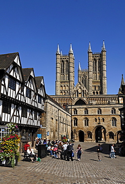 Lincoln Cathedral or St. Mary's Cathedral, 12th and 13th Century, Gothic-Romanesque, front left half-timbered building built in a Tudor style, Minster Yard, Lincoln, Lincolnshire, England, UK, Europe