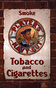 Old metal advertising sign for Player's Navy Cut in a tavern, Cuborough, Staffordshire, England, United Kingdom, Europe