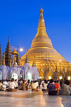 Burmese people praying in front of the Golden Stupa, Shwedagon Pagoda, at night, Rangoon, Yangon, Burma, Burma, Myanmar, Asia