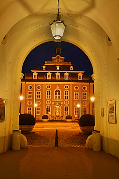 Gate and walkway through the courtyard to the main entrance of Bruchsal Castle, Baden-Wuerttemberg, Germany, Europe