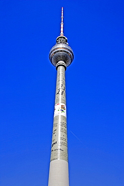 TV tower on Alexanderplatz square used as an advertising pillar, Berlin, Germany, Europe