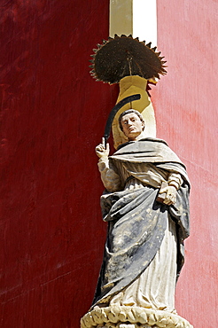 Monk, saint, figure, facade, red house wall, corner, Lorca, Murcia, Spain, Europe