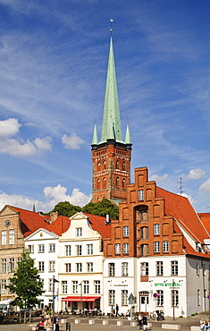 Classical town mansions with typical gables at the upper Trave river, in the back the church of St. Petri, Luebeck, Schleswig-Holstein, Germany, Europe