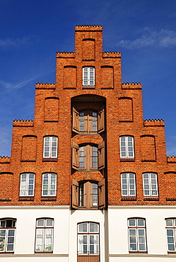 Classical storehouse with typical stepped gable at the upper Trave river, Luebeck, Schleswig-Holstein, Germany, Europe