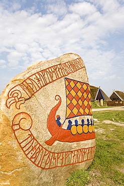 Inscription and a Viking boat on a rune stone, at the Viking Museum in Bork on Ringkoebing Fjord, West Jutland, Denmark, Europe