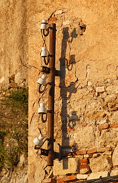 Broken insulators and their shadows in soft morning light, Ronda, Andalusia, Spain, Europe