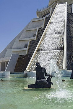 Fountain in front of a pyramid-shaped department store at Independence Park, Ashgabat, Turkmenistan