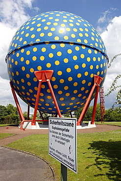 Artistically designed spherical container for the intermediate storage of natural gas during gas usage peak times, ELE, Emscher-Lippe-Energy, regional energy provider in the Ruhr Area, Gelsenkirchen, North Rhine-Westphalia, Germany, Europe