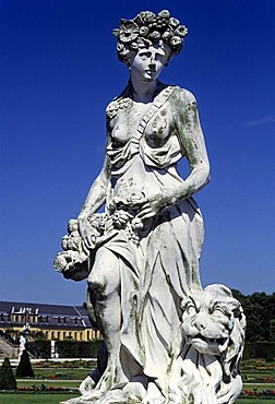 Allegorical statue, woman with fruits and flowers in her hair, lion, Herrenhaeuser Gardens, Hanover, Lower Saxony, Germany, Europe