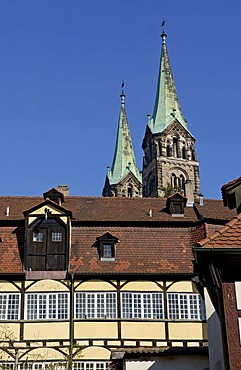 Old half-timbered house, in front of the towers of Bamberg Cathedral, Bamberg, Upper Franconia, Bavaria, Germany, Europe