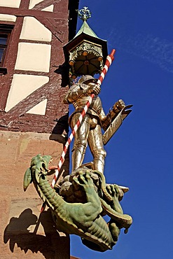 Saint George figure with dragon on a half-timber house, Nuremberg, Bavaria, Germany, Europe