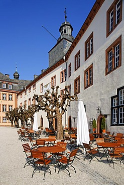 North wing with restaurant "Schloss-Schaenke", patio, Berleburg Castle, Bad Berleburg, district of Siegen-Wittgenstein, Rothaarsteig, North Rhine-Westphalia, Germany, Europe