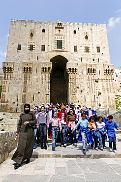 School class in front of the citadel, Aleppo, Syria, Middle East, Asia