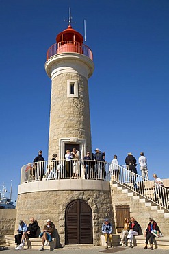 Tourists visiting the lighthouse of Saint-Tropez, Departement Var, at the Cote d'Azur, Provence, Southern France, France