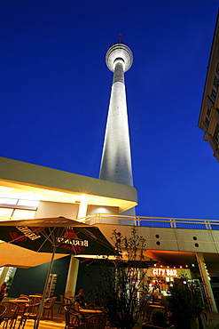 Forecourt of the Fernsehturm TV tower and Bahnhof Alexanderplatz station at the blue hour, Mitte district, Berlin, Germany, Europe