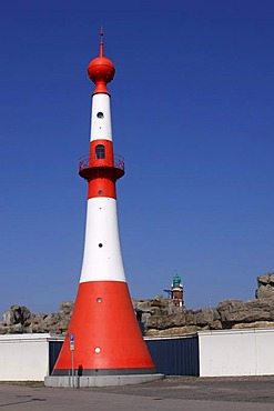 Old lighthouses in Bremerhaven, red-wight Bremerhavener Leuchtbarke Unterfeuer "Minarett" lighthouse in the front, Grosser Leuchtturm Bremerhavener Oberfeuer "Loschenturm" lighthouse in the back, between them a zoo on the sea, Bremerhaven, hanaseatic city