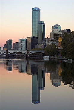 Skyline of Melbourne and its reflection in the Yarra River in the early morning, Victoria, Australia