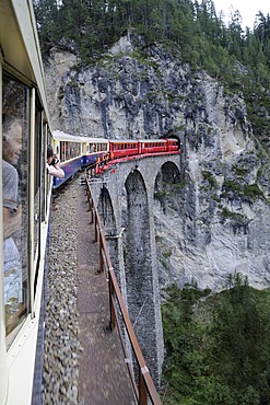 RhB, Rhaetian Railway train crossing the Landwasser Viaduct near Filisur, Albula section, Filisur, Graubuenden, Switzerland, Europe