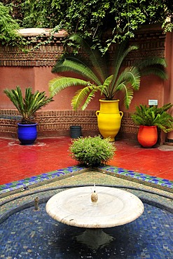 Water basin and flower pots in the Jardin Majorelle, Marrakech, Morocco, Africa