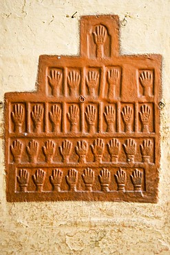 Sati stones, hand imprints of the 15 royal widows of Maharaja Man Singh who committed self-immolation, Mehrangarh Fort, Jodhpur, Rajasthan, India, South Asia