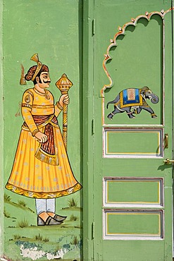 Door painted green with a Maharaja and a running elephant, City Palace, Udaipur, Rajasthan, India, South Asia