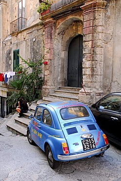 Blue Fiat 500 in the historic centre of Tropea, Vibo Valentia, Calabria, South Italy, Europe