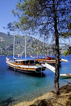 Cleopatra Hamami Bay, ancient bathing resort, yachts in the Bay of Fethiye, Mugla Province, Mediterranean, Turkey