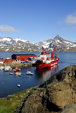 Supply ship of Royal Arctic Line in Kong Oscar Fjord, Ammassalik, East Greenland, Greenland