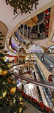 Christmassy decorated shopping centre with escalator, City Point, Nuremberg, Middle Franconia, Bavaria, Germany, Europe