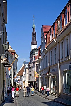 Alley in the historic centre and St. Olaf's church, Tallinn, Estonia, Baltic States, North Europe