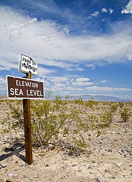 A sign announces sea level in Death Valley National Park, Death Valley, California, USA