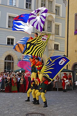 Regensburg Ratisbon Oberpfalz Bavaria Germany Buergerfest in the historic center flag threwing sbandiatori in front of the old city hall