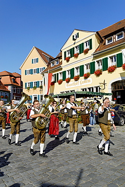 Parade with traditional costumes Marktplatz market square Feuchtwangen Middle Franconia Bavaria Germany