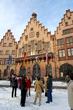 DEU, Germany Frankfurt, historical Roemer mountain in winter with Korean tourist,