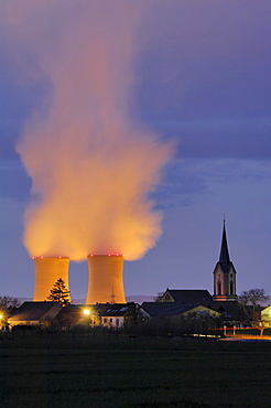 Grafenrheinfeld Nuclear Power Plant next to the church steeple of Roethlein, Lower Franconia, Bavaria, Germany, Europe