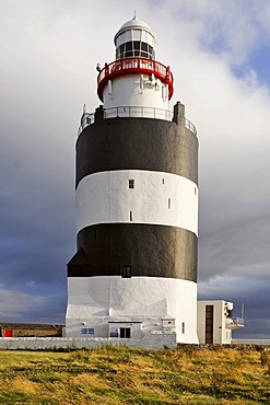 Lighthouse of HookÂ¥s Head which is dating back to the 13.th century, County Wexford, Ireland